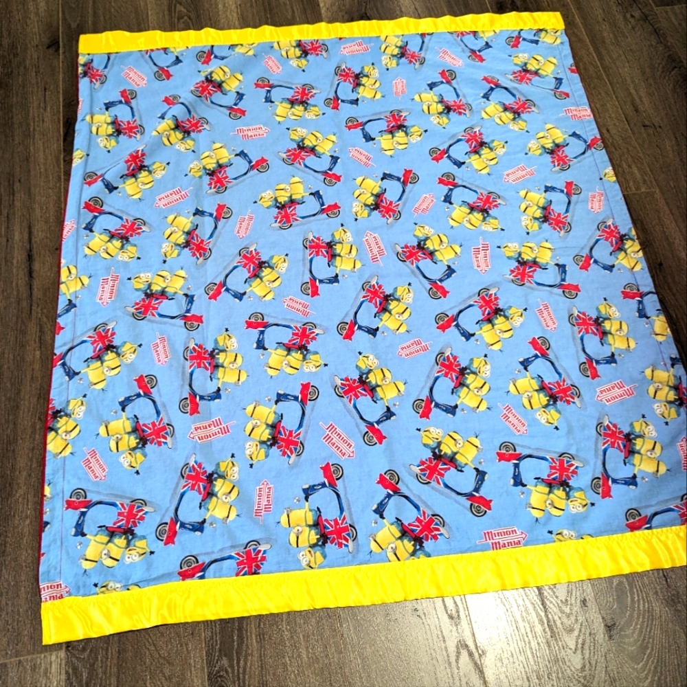 Minion Mania cotton and velvety soft blanket. Satin trim. Possibly hand made.